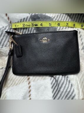 Coach Black Pebbled Leather Zip Wristlet with Gold Logo